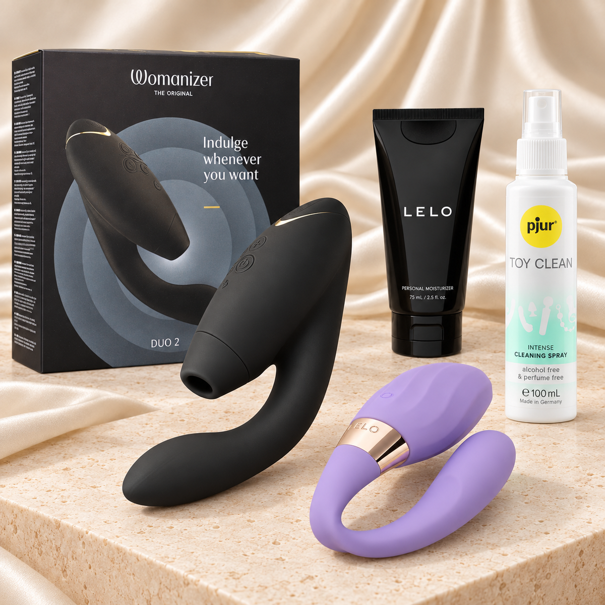 Double Desire Paar-Set mit Womanizer DUO 2 Schwarz, LELO TIANI Twist Lavender, LELO Gleitgel und pjur Toy-Reiniger