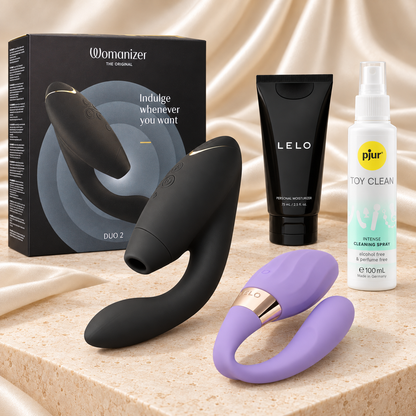 Double Desire Paar-Set mit Womanizer DUO 2 Schwarz, LELO TIANI Twist Lavender, LELO Gleitgel und pjur Toy-Reiniger